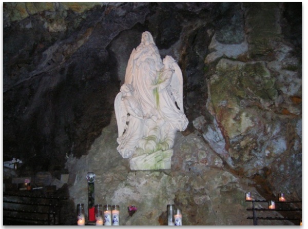 Statue of St Mary Magdalene being raised up by angels at la Sainte-Baume