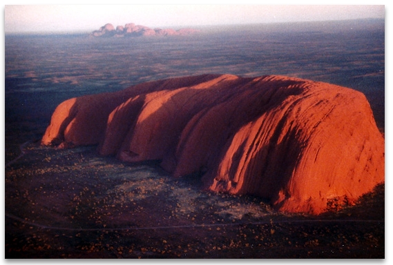 Uluru with Kata Tjuta in the background